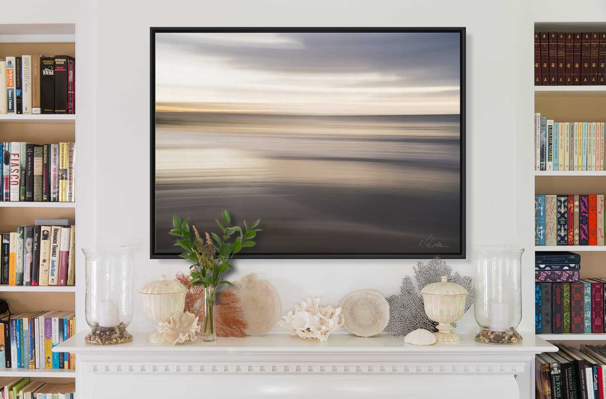 large canvas abstract print with float frame over mantle in living room
