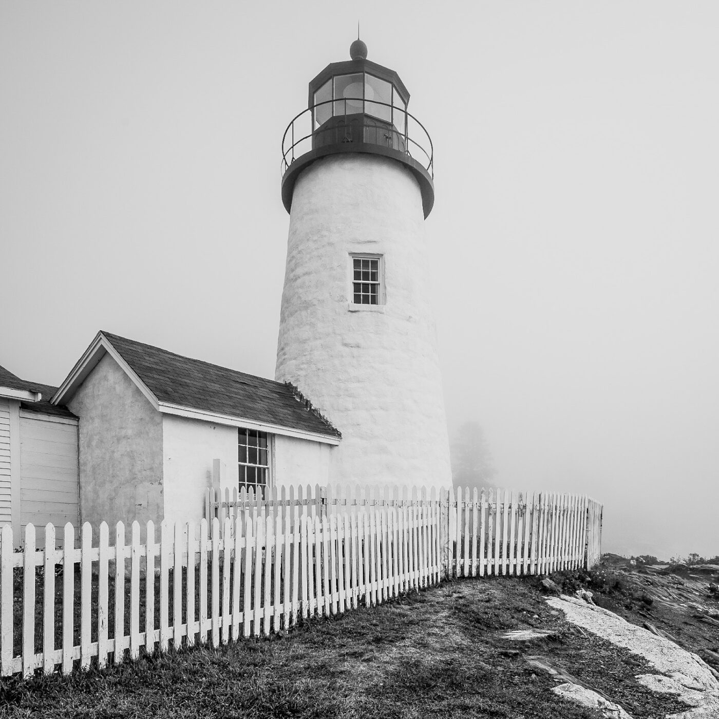 Lighthouse-Sentinel-On-Rocky-Shore